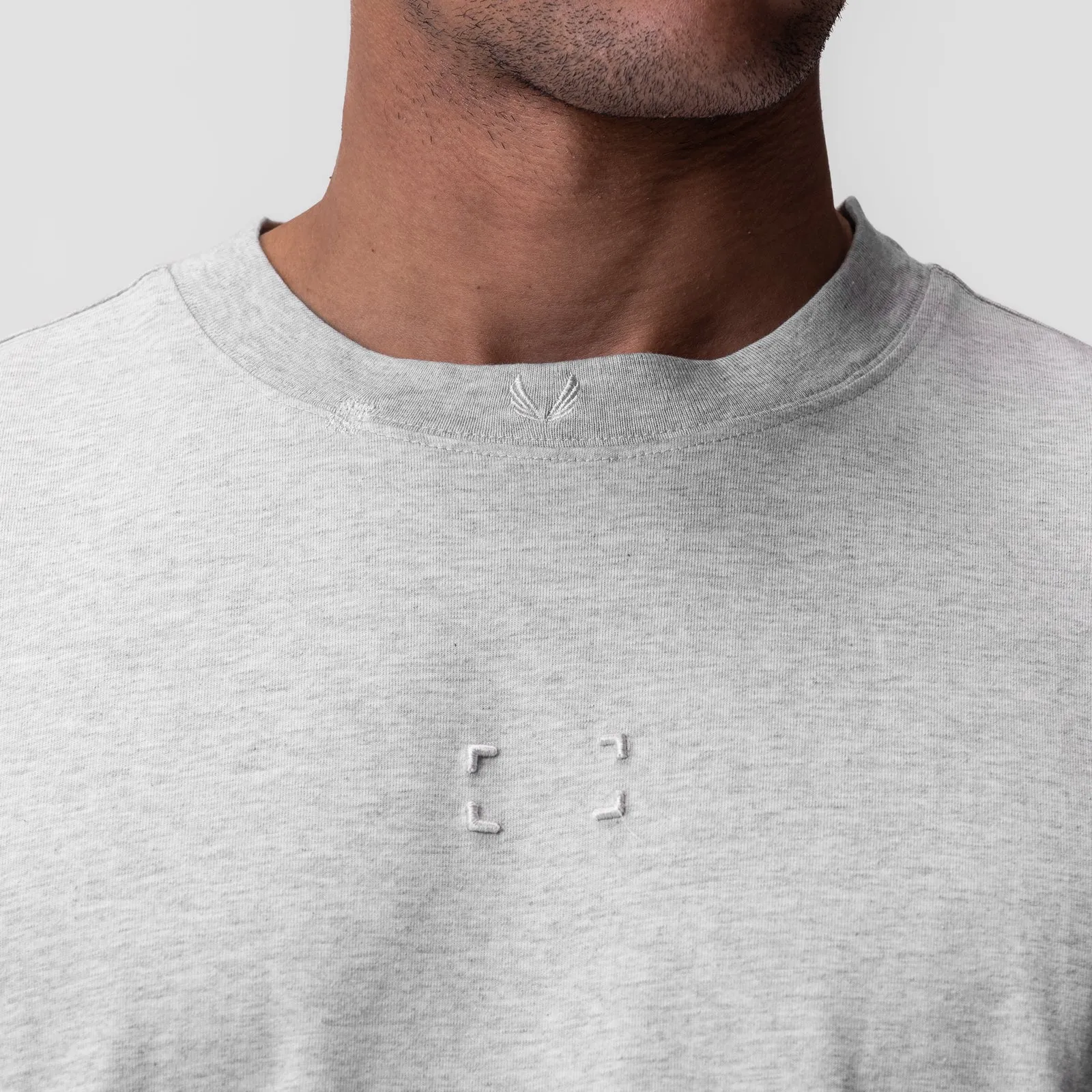 0797. Tech Essential™ Relaxed Tee - Heather Grey "Space Bracket"